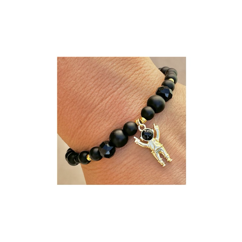 Bracelet perles onyx, pendentif astronaute